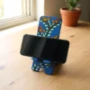 madhubani bird mobile phone stand with mobile kept