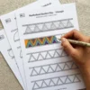 madhubani border design practice pages being filled
